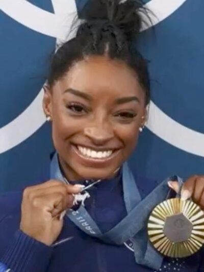 Simone Biles with gold medal - YouTube screenshot