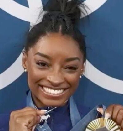Simone Biles with gold medal - YouTube screenshot