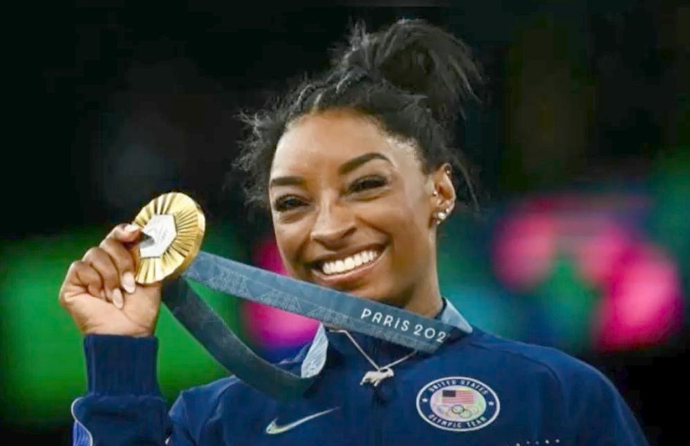 Simone Biles with gold medal - YouTube screenshot
