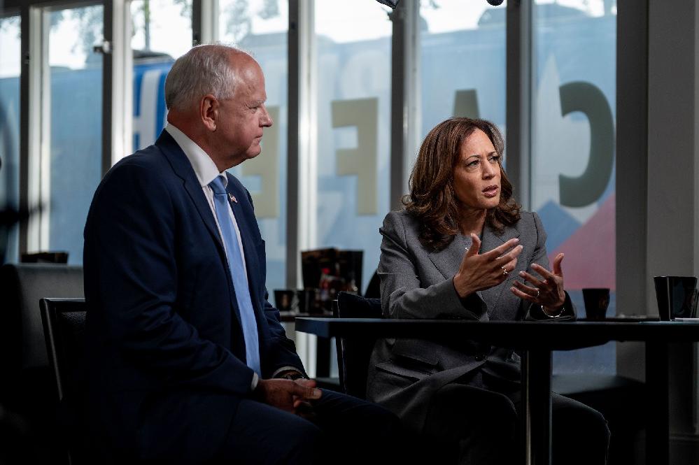 Kamala Harris cites experience for shifts on fracking, immigration // Tim Walz and Kamala Harris (Will Lanzoni-CNN via CNN Newsource) 