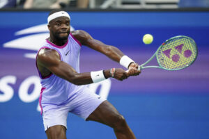Frances Tiafoe hits a forehand during a men's singles match at the 2024 US Open on Monday, Aug. 26, 2024 in Flushing, NY. (Manuela Davies/USTA)