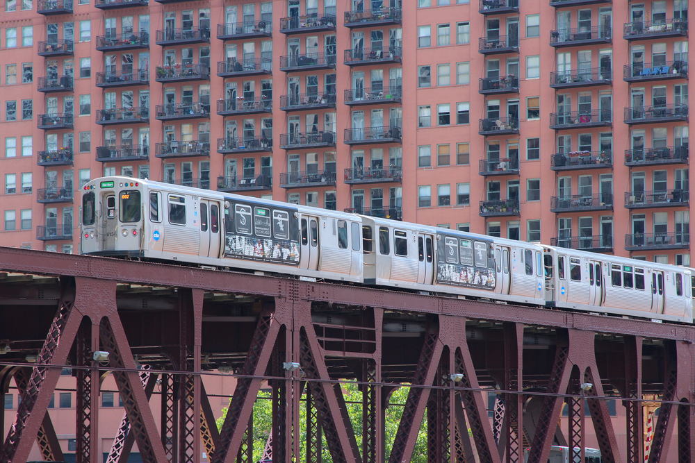our passengers fatally shot while sleeping on Chicago train. // CTA train - Depositphotos