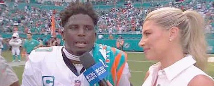 Tyreek Hill detained by police; bodycam footage released. // Tyreek Hill being interviewed after game - screenshot