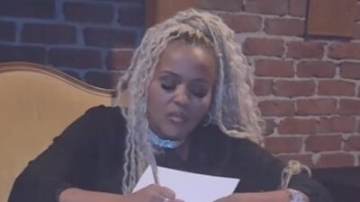 Adrianne Michelle Spain autographing book (Girl, Breathe Again) - IG screenshot