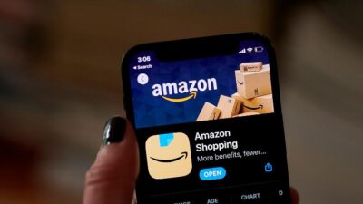 Amazon (dot) com on smartphone (Gabby Jones-Bloomberg-Getty Images via CNN Newsource)