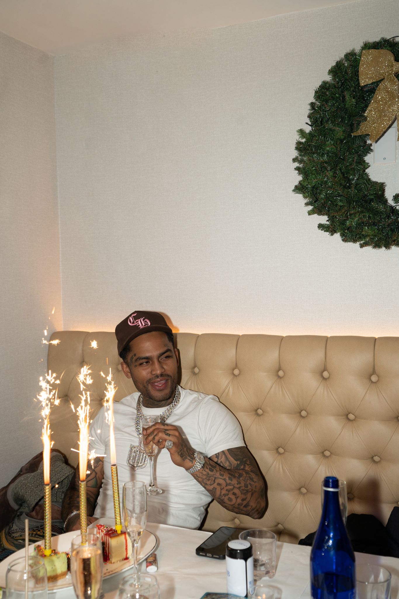 Dave East Receives Art Piece Honoring Late Rapper Kiing Shooter // Dave East at tribute (photo by Melissa Nyomi Stoll)