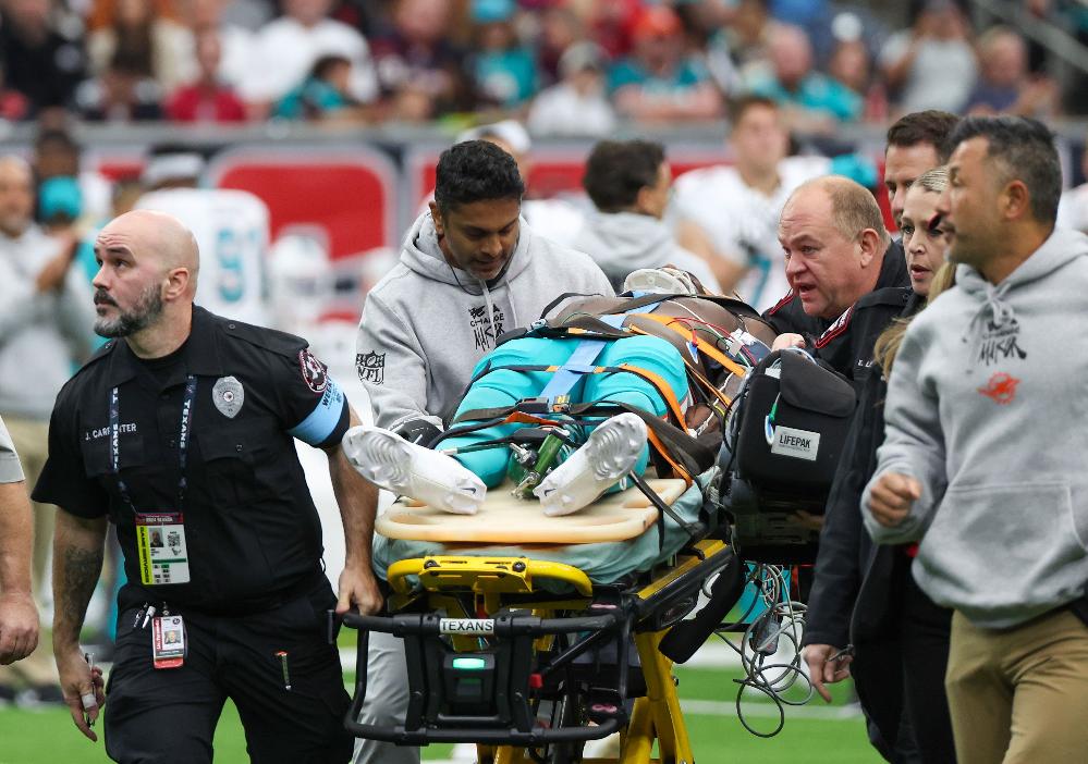 Dolphins&rsquo; Grant DuBose Suffers Head Injury in Loss to Texans // Grant DuBose on stretcher (Thomas Shea-USA Today Sports-Reuters via CNN Newsource) 