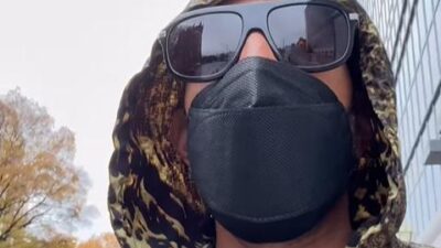 Ludacris wearing mask and hoodie after jury duty summons - via Instagram