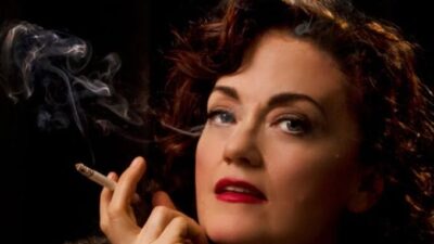 Morgana Shaw as Bette Davis