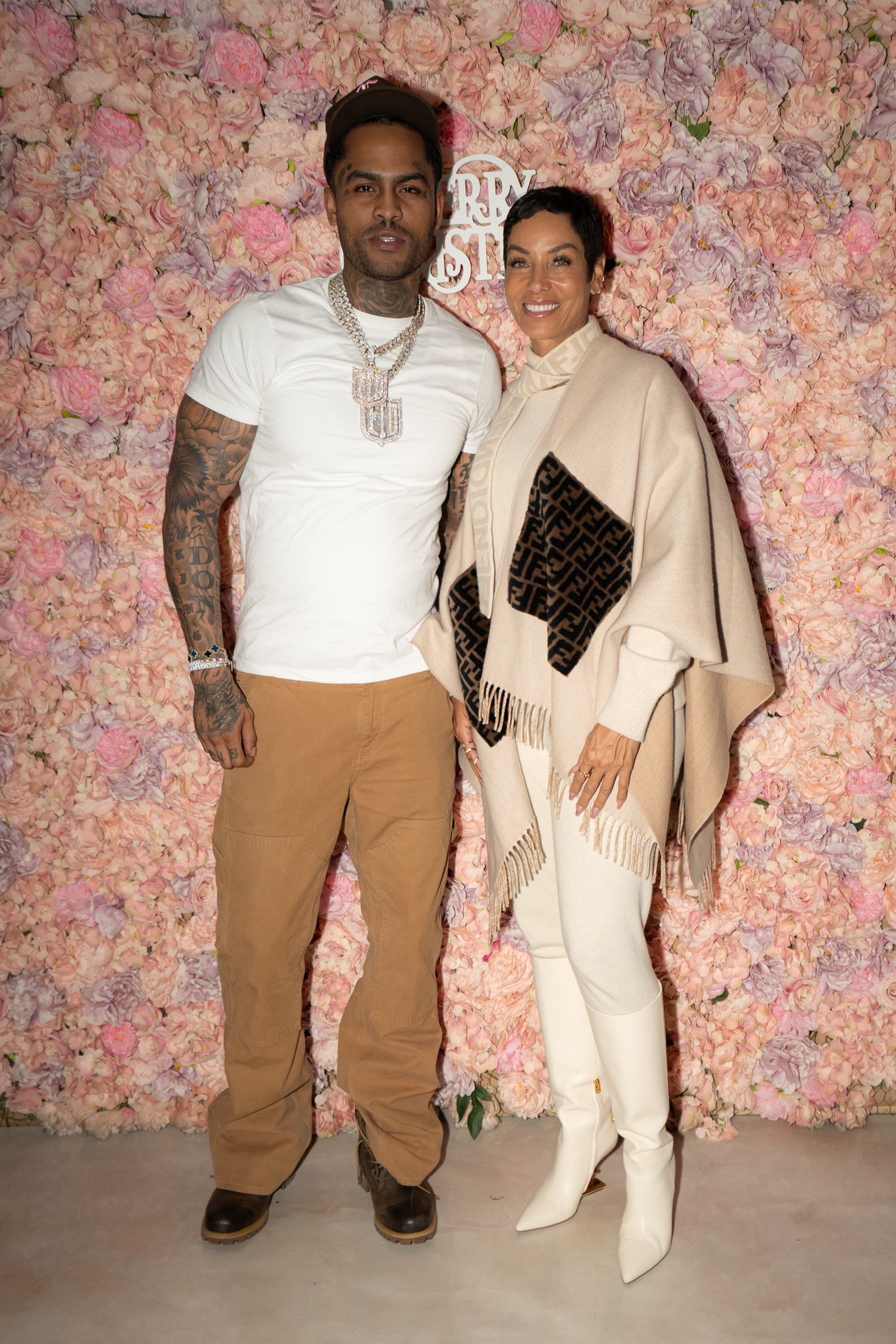 Dave East Receives Art Piece Honoring Late Rapper Kiing Shooter // Dave East and Nicole Murphy (photo by Melissa Nyomi Stoll)