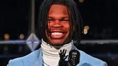Travis Hunter accepting Heisman Trophy - screenshot