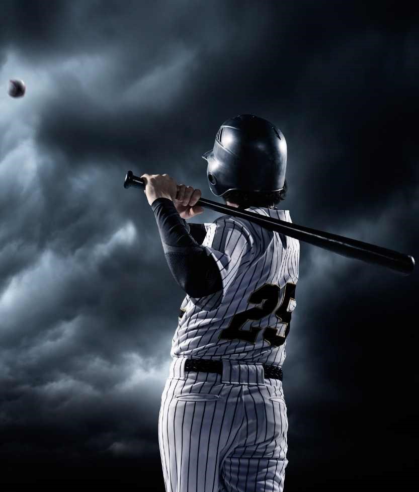 Young baseball player at bat - Photo by Dmytro Aksonov c. via Canva.com