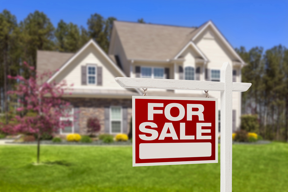 Home For Sale Sign in Front of New House