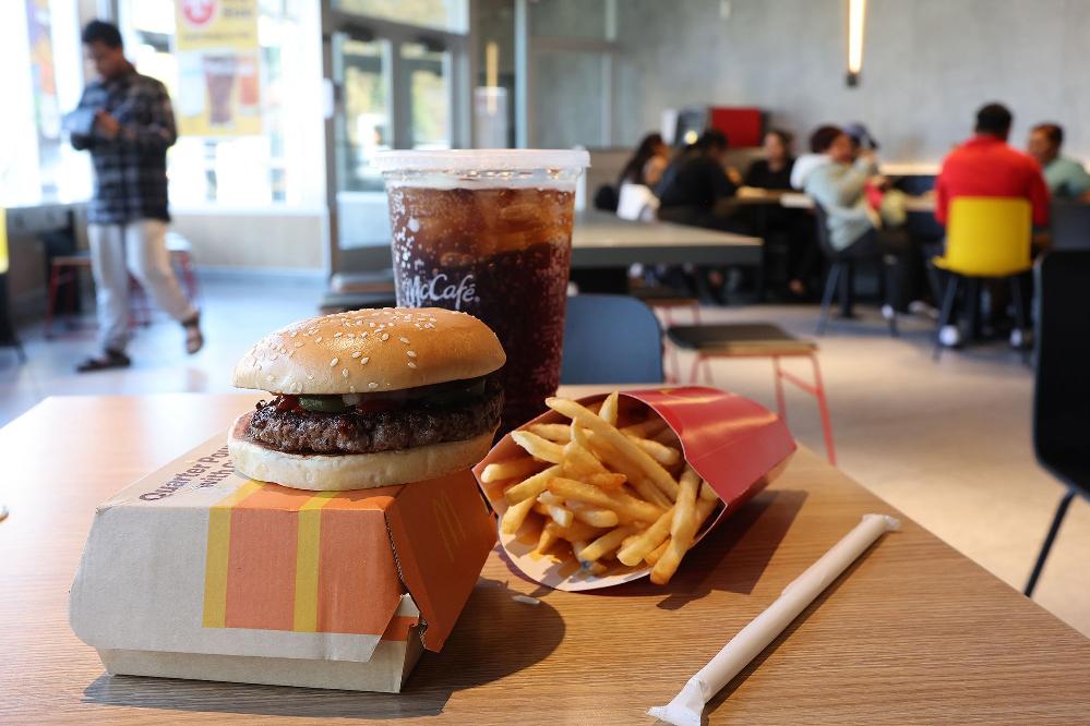 McDonald&rsquo;s Scales Back DEI Initiatives // McDonald's Restaurant and food items (Michael M Santiago-Getty Images via CNN Newsource)