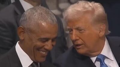 Obama and Trump laughing it up at Jimmy Carter Funeral - screenshot