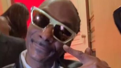 Snoop Dogg - shows peace sign after performing at Trump Crystal Ball
