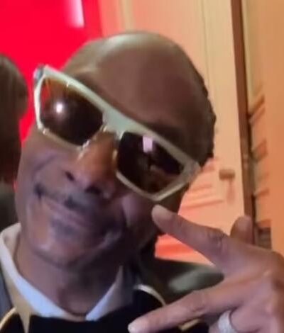 Snoop Dogg - shows peace sign after performing at Trump Crystal Ball