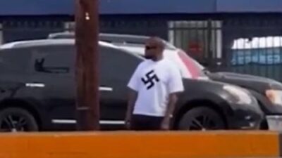 Kanye West wearing swastika t-shirt / via screenshot