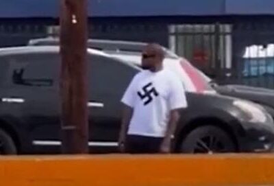 Kanye West wearing swastika t-shirt / via screenshot