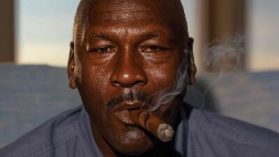 Michael Jordan smoking a cigar - via Grok AI