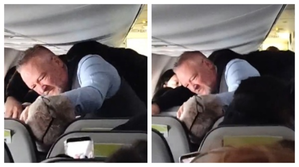 Alaska AFlight Attendant Fights Unruly Passenger on Alaska Airlinesirlines