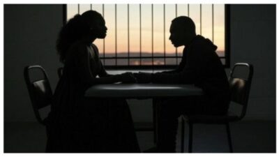 silhouette of couple in jail