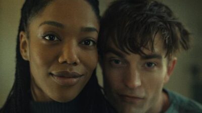 Naomi Ackie as Nasha and Robert Pattison as Mickey 17 in 'MICKEY 17' - via Warner Bros. Pictures