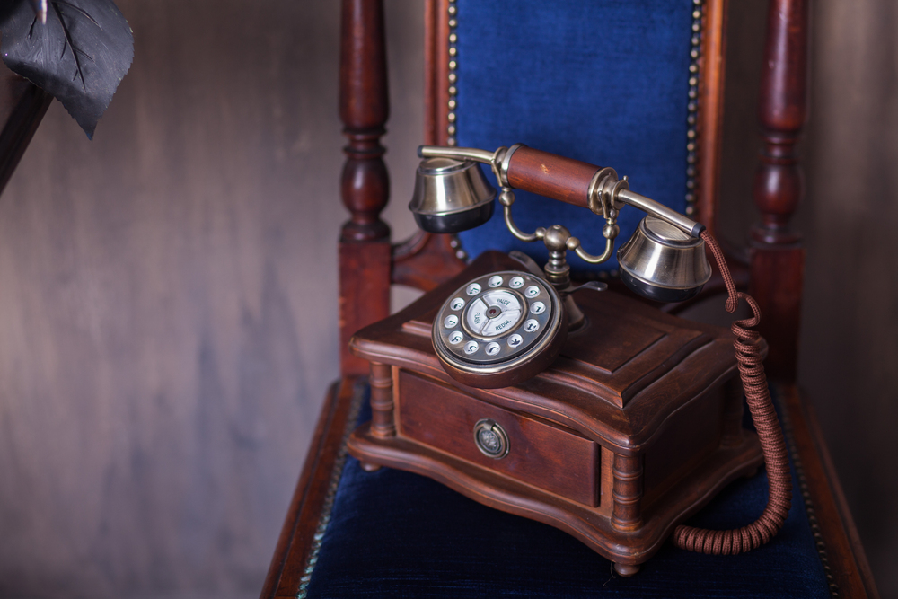 Anita Baker's 'I Apologize' the Last of 'Operator Songs' Era // Old time rotary phone - Depositphotos