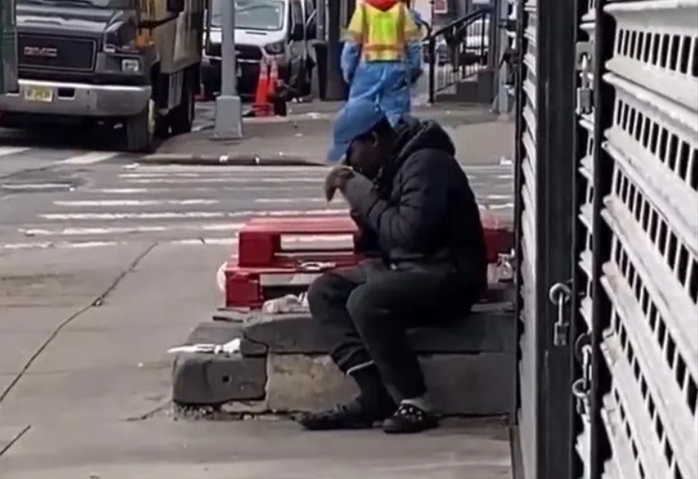 Man Eats Rat on NYC Sidewalk