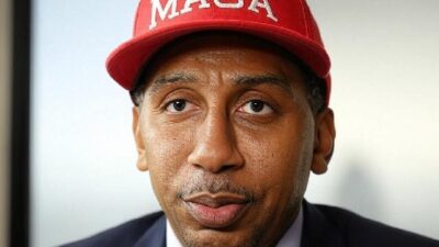 Stephen A Smith wearing MAGA cap - via Grok AI