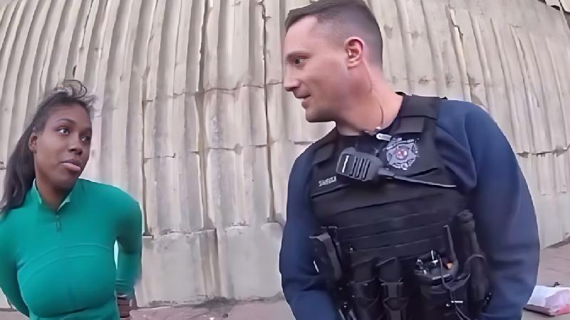 Ebonie Collins and CPD Officer - screenshot (Via X)