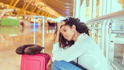 Woman who missed her flight - Depositphotos
