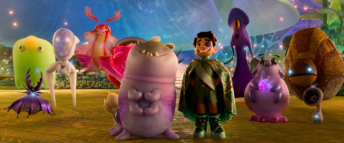 Pixar’s Elio Blasts Off on a Cosmic Journey of Identity // TAKING UP SPACE – When 11-year-old Elio (voice of Yonas Kibreab) is beamed up to space, he finds himself in the Communiverse. He makes his first real friend, an alien called Glordon (voice of Remy Edgerly), and meets representatives from galaxies far and wide. Among them are Ambassador Tegman (far right), Ambassador Helix (second from right), Ambassador Turais (third from right) and Ambassador Questa (left of Glordon). Disney and Pixar’s “Elio” releases in theaters June 20, 2025. © 2025 Disney/Pixar. All Rights Reserved.