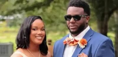Alexus Lee and John 'JR' Collins & their son - via Facebook