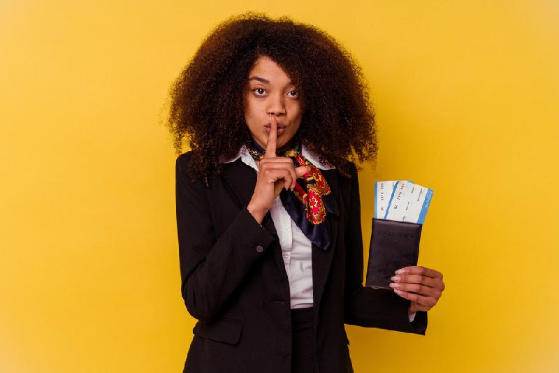 Keeping A Secret - African American woman - Depositphotos