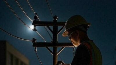 Utility Company Worker in Blackout / via Grok AI