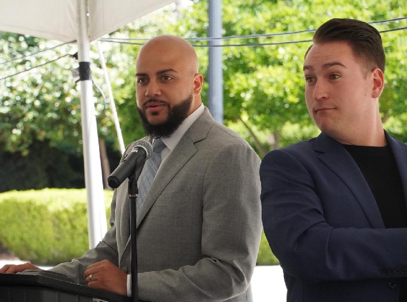 Alongside a sign language interpreter, Asm Isaac Bryan (D-Ladera Heights), left, shares his experiences of living in foster care with individuals with disabilities CBM photo by Antonio Ray Harvey
