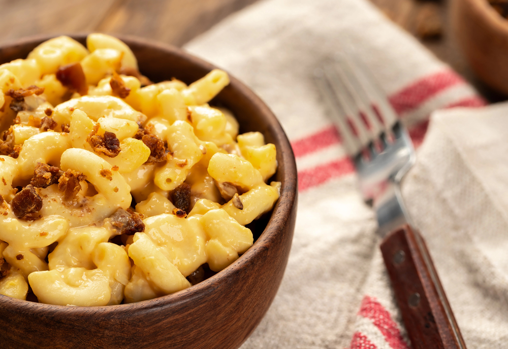 Closeup of macaroni and cheese with bacon pieces