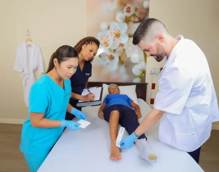 Gentell associates attend to patient