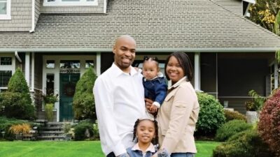 Black Family in front of new home
