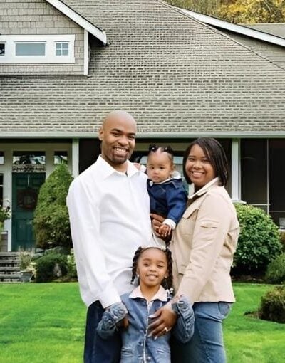 Black Family in front of new home