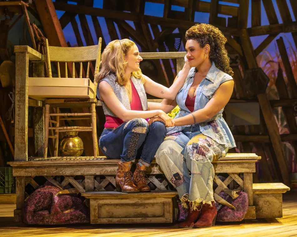 Danielle Wade as Maizy and Miki Abraham as Lulu in The North American Tour of SHUCKED. Photo by Matthew Murphy and Evan Zimmerman