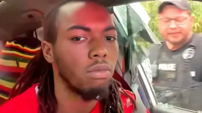 Florida cop smashes window of car driven by William McNeil Jr.