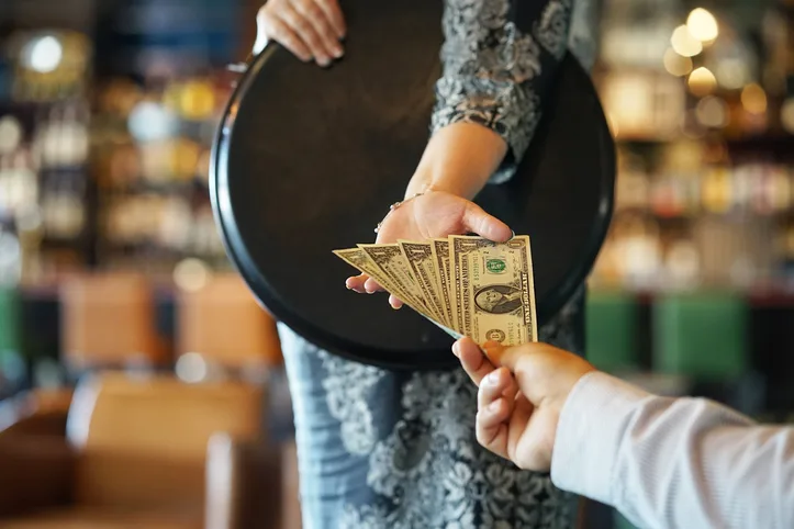 waitress gets a tip stock photo