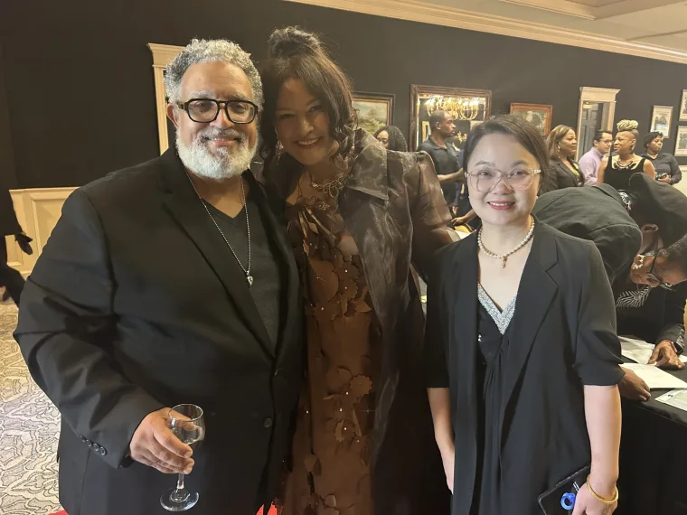 Mr Ashton Hall, Fashion Designer, Author, Entrepreneur, with his wife, Mrs Hall, and a guest supporter