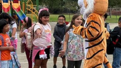 LAEP - Harrison Elementary mascot ignites pure joy and school spirit with students as they practice for event