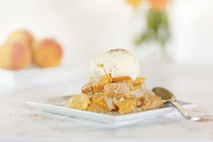 peach cobbler with vanilla ice cream