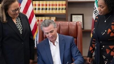 CA Gov Gavin Newsom signs SB 518 which establishes the Bureau for Descendants of American Slavery - Photo courtesy of the Office of Gov. Gavin Newsom