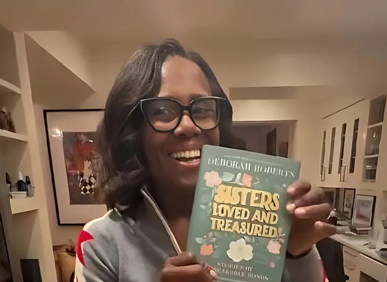 Deborah Roberts show off her new book - screenshot via Instagram 