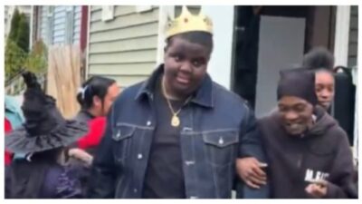 teen dresses as The Notorious B.I.G. for Halloween.
